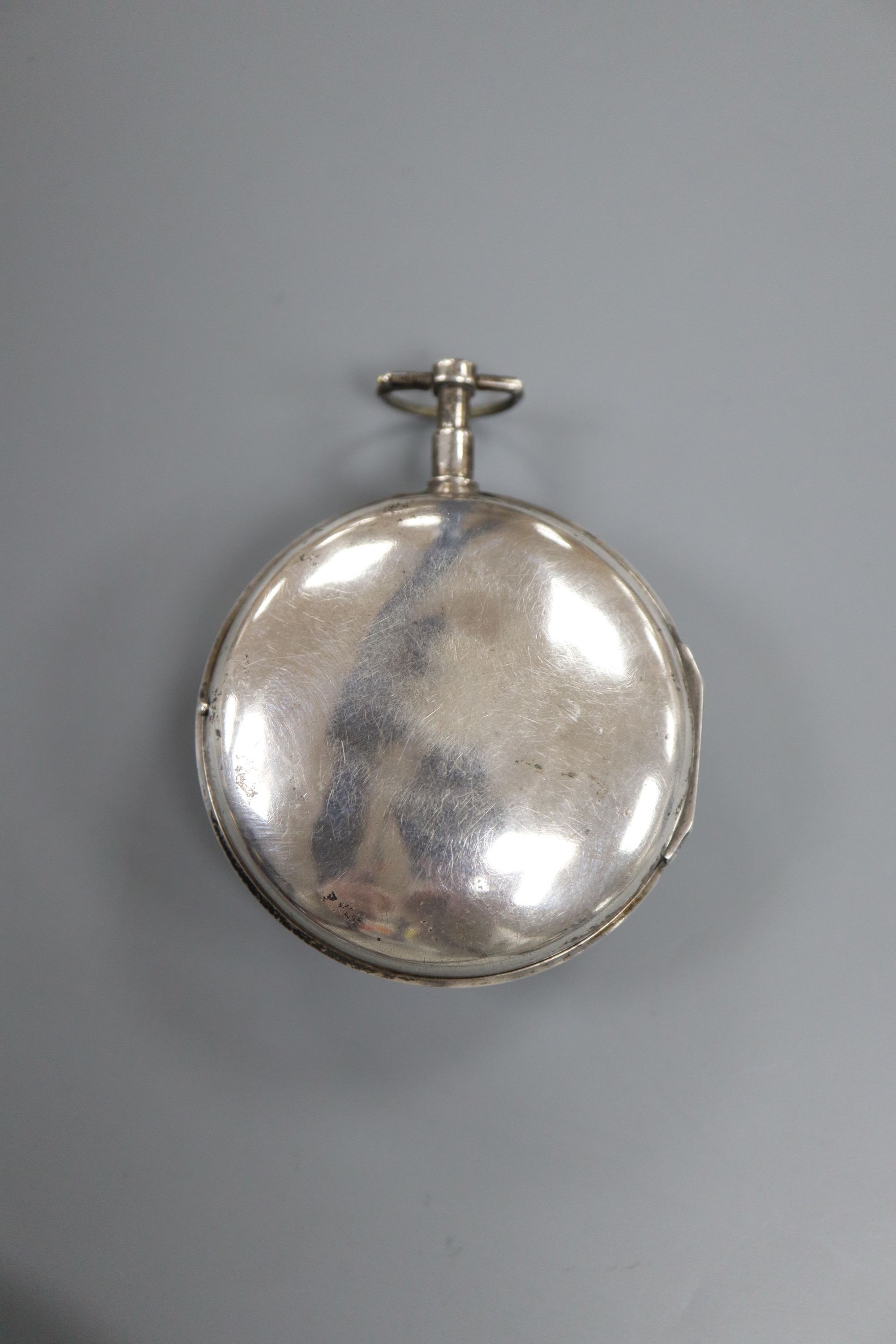 An early 19th century French? white metal pair cased(outer case missing) keywind verge pocket watch,